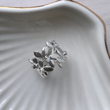 Forest blad ring i sølv med topaser