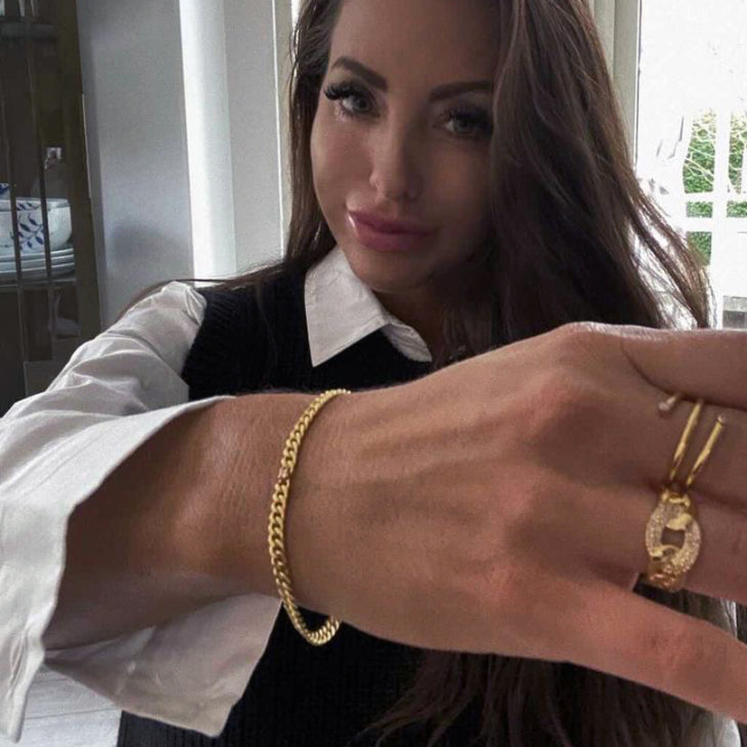 Infinity armbånd i sølv med brillantslebet diamant 